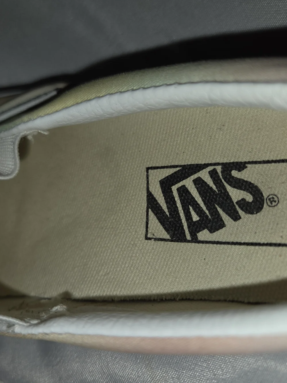 Vans Slip-On Sneakers in Cream and White